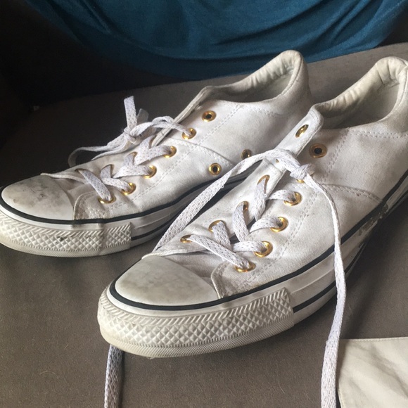 white converse with gold tongue
